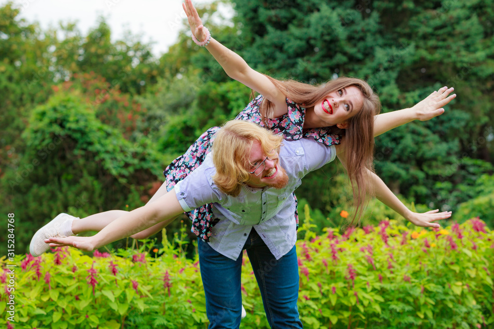 Obraz premium Couple having fun together outdoor.