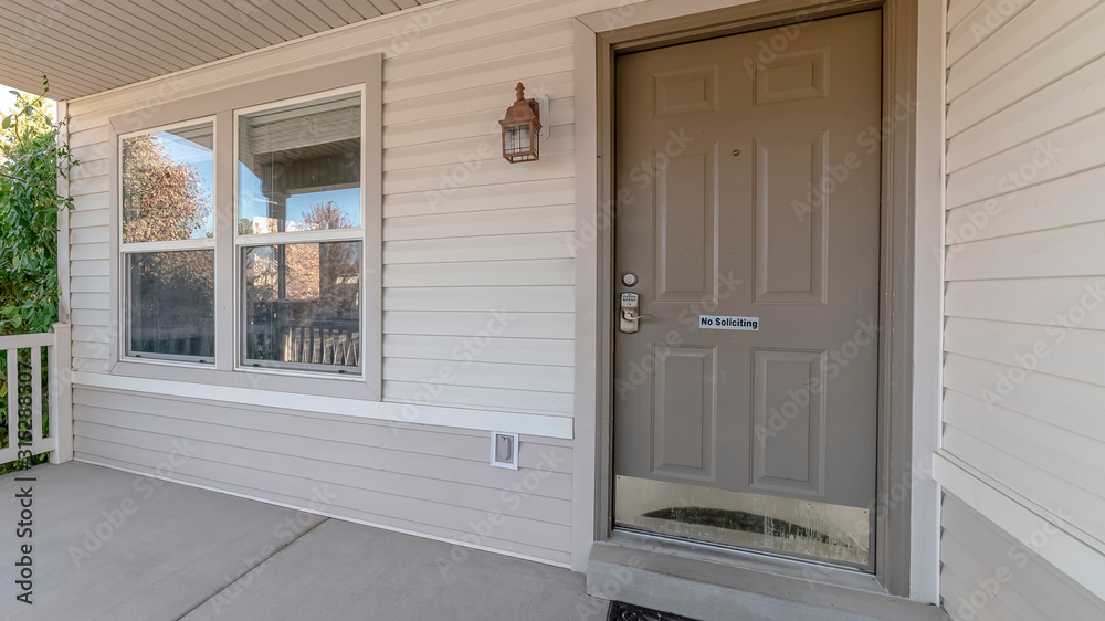 Fototapeta premium Panorama frame Covered front porch with grey and white decor