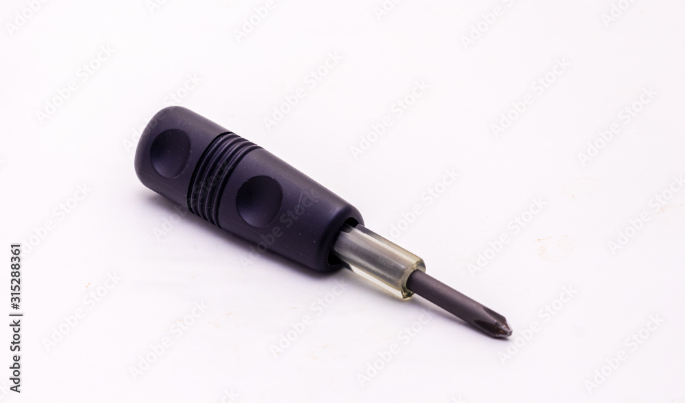 Phillips screwdriver with black plastic handle isolated on white background Phillips screwdriver with black plastic handle isolated on white background