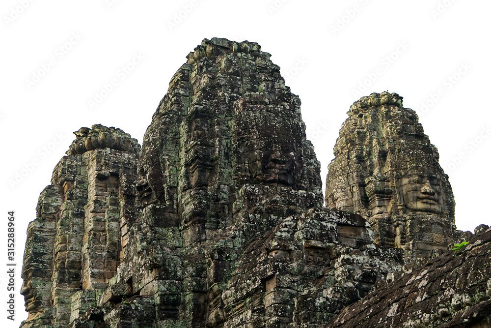 Prasat Bayon, temple of the ancient complex of Angkor Wat, towers against the sky Prasat Bayon, temple of the ancient complex of Angkor Wat, towers against the sky
