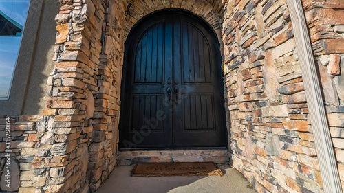 Panorama Arched door and entry passage to a house