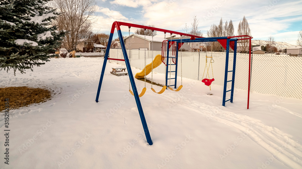 Panorama frame Kids playground in winter snow day light Panorama frame Kids playground in winter snow day light