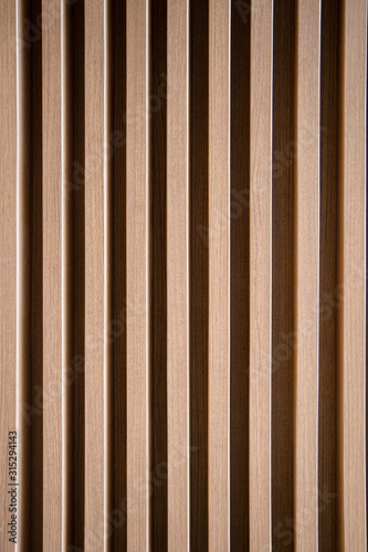 Bilde på lerret Close up vertically Texture of Large Brown decorative wooden battens wall pattern background