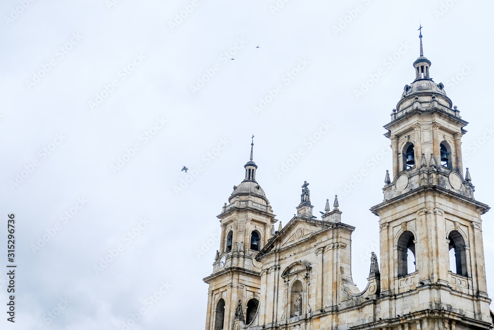 Colombia. Bogota. Plaza de bolivar Exterior facade of the church in a collannic style against the sky.