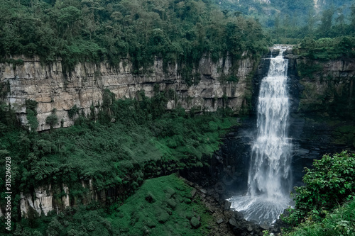 Salto del Tequendama - a waterfall on the Bogot   River in Colombia. Beautiful cascading  very long waterfall in the canyon.