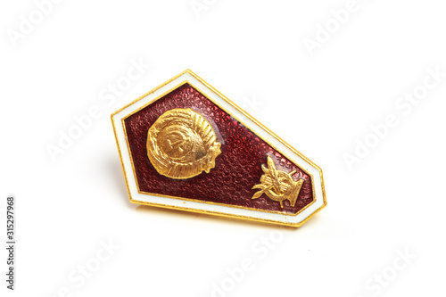 Komsomol badge of the USSR. Isolated on white. - Image
