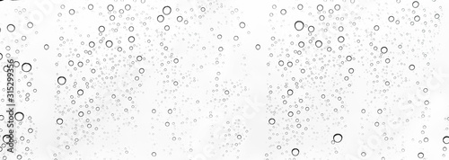 Rain drops on window glasses surface Natural Pattern of raindrops. Natural pattern of raindrops on white background for your design.