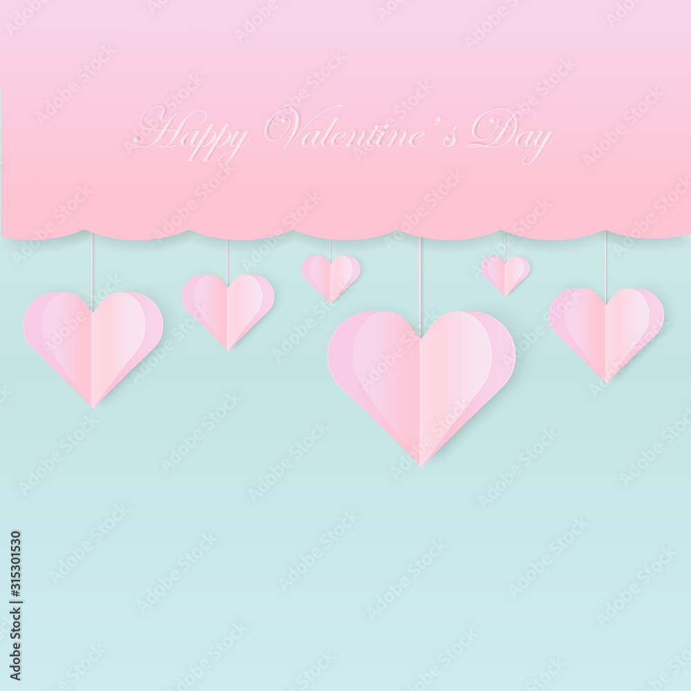 Hanging mobile of pink paper art on blue background with copy space for your text. Valentine day concept.