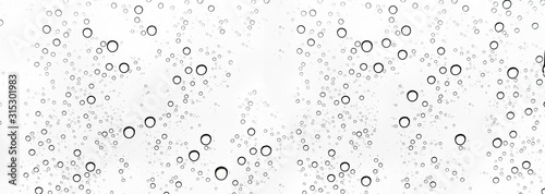 Rain drops on window glasses surface Natural Pattern of raindrops. Natural pattern of raindrops on white background for your design.