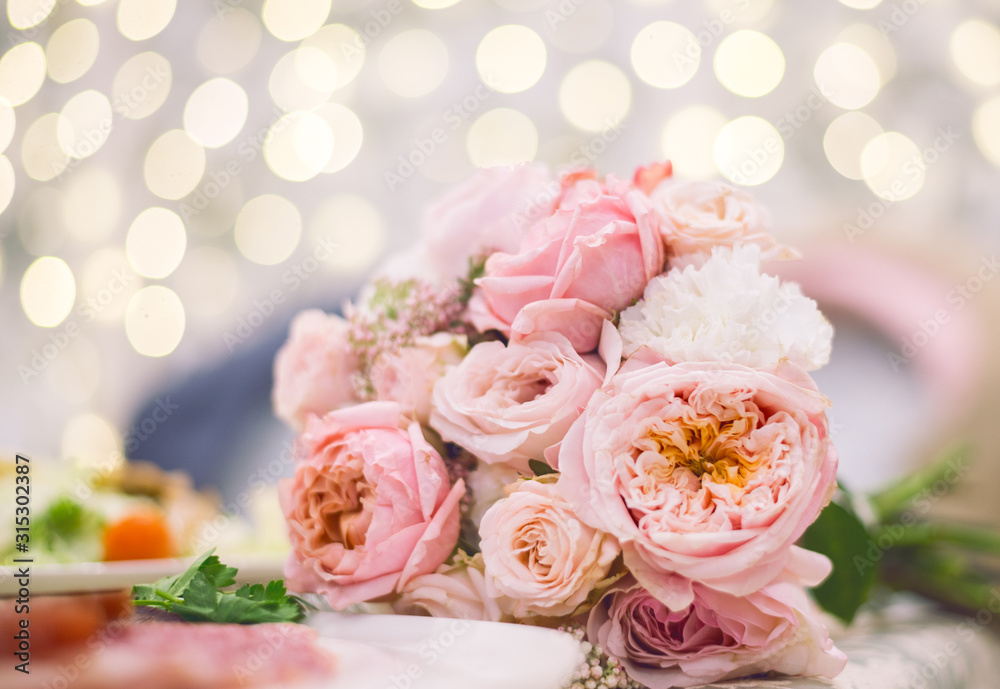 wedding bouquet close-up. Against the background of lights. Valentine's day