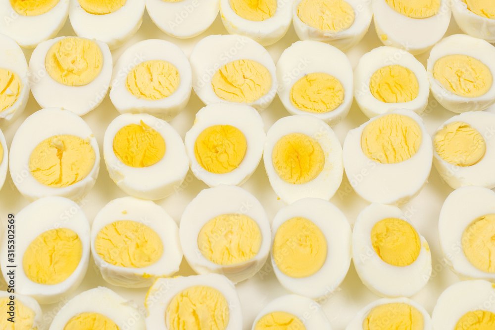 Half boiled eggs background.