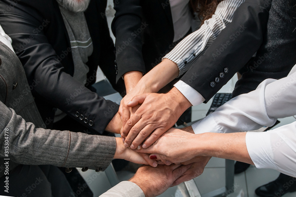 group of diverse professionals showing their unity group of diverse professionals showing their unity