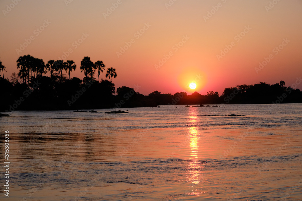 Sunset on the Zambesi river close to Victoria Falls, Zimbabwe
