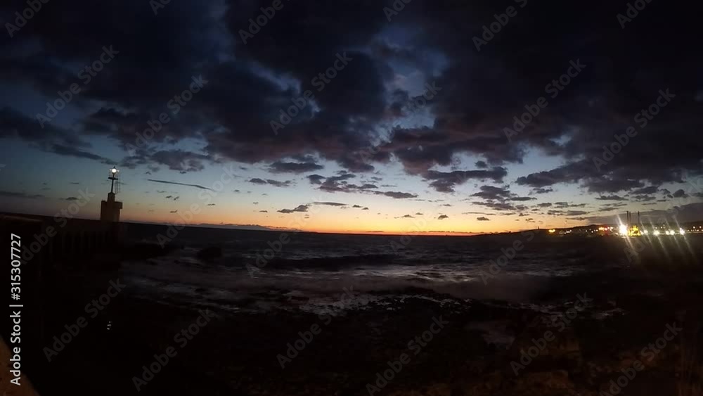 it is a time lapse of the coast of the south of Italy. I made it during the Christmas holiday. the sky is full of clouds and when the sun came the sky take amazing colors it is a time lapse of the coast of the south of Italy. I made it during the Christmas holiday. the sky is full of clouds and when the sun came the sky take amazing colors