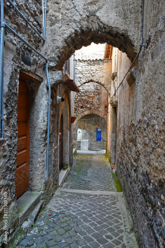 Guarcino  Italy  01 03 2020. An alley between the old houses of a medieval village.