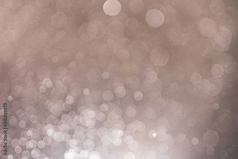 Abstract bokeh from light and water spray in backgrounds of various colors Abstract bokeh from light and water spray in backgrounds of various colors