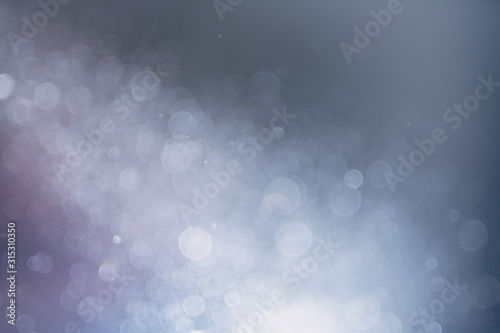 Abstract bokeh from light and water spray in backgrounds of various colors