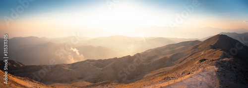 Panorama of the mountains at sunset. © LALSSTOCK