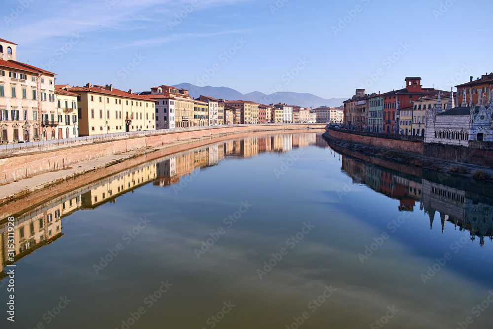 View from a bridge over Arno river in Pisa 