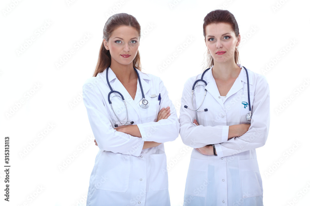 Two young woman doctor , standing in hospital. Two young woman doctor. Two young woman doctor , standing in hospital. Two young woman doctor.