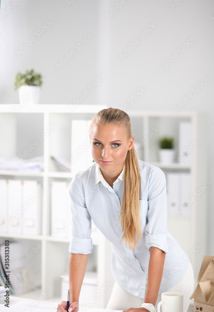 Woman engineer discussing meeting for architectural project working with partner and engineering tools on workplace Woman engineer discussing meeting for architectural project working with partner and engineering tools on workplace
