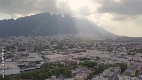 Stationary Aerial Perspective Pans LTR from Cerro de las Mitras to Monterrey Mexico Cityscape Below photo