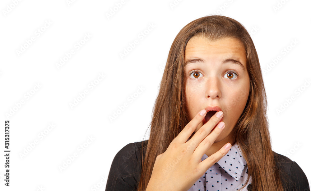 surprised brunette teen girl covering her mouth with hand surprised brunette teen girl covering her mouth with hand