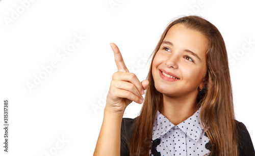 teen girl looking upwards in interest