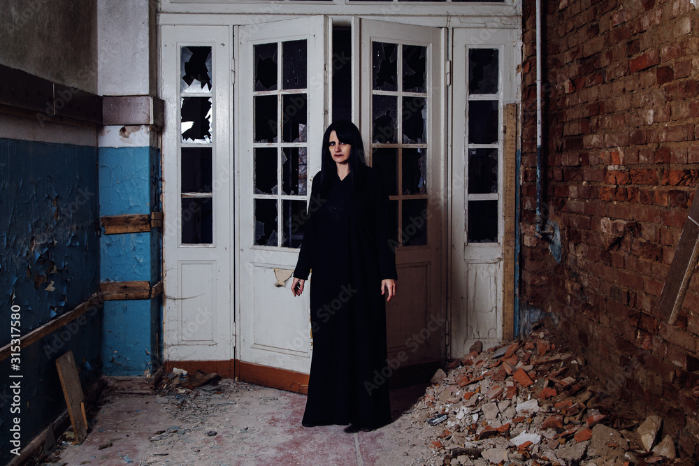 gothic woman in an abandoned house gothic woman in an abandoned house