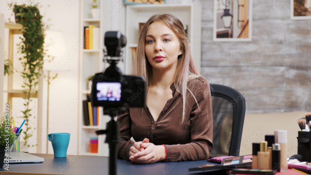 Female makeup artist recording a vlog how to use the right cosmetics Female makeup artist recording a vlog how to use the right cosmetics