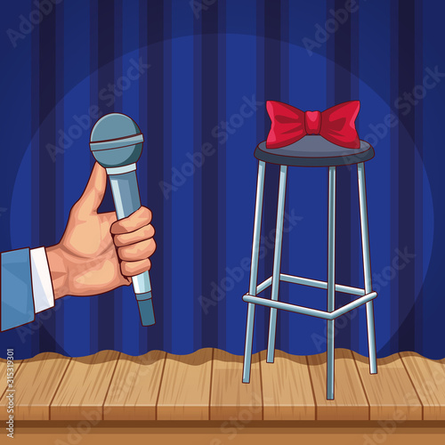 hand with microphone stool bow stand up comedy show
