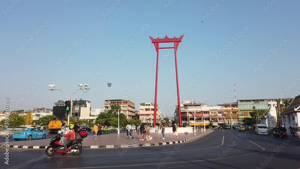 Giant swing or Sao Ching Cha landmark in Bangkok city, BANGKOK, THAILAND. With noise and burry bokeh background.
