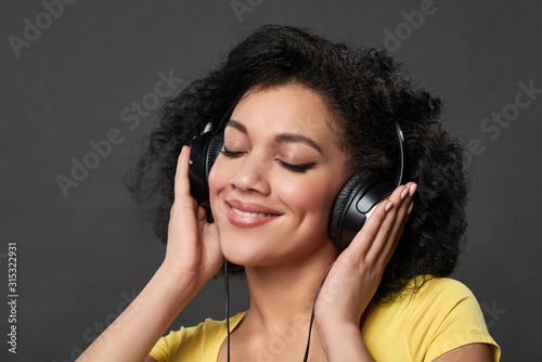 Woman listening music with closed eyes