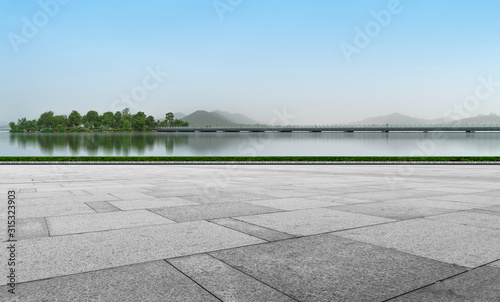 Empty Plaza Floor Bricks and Beautiful Natural Landscape © 昊 周