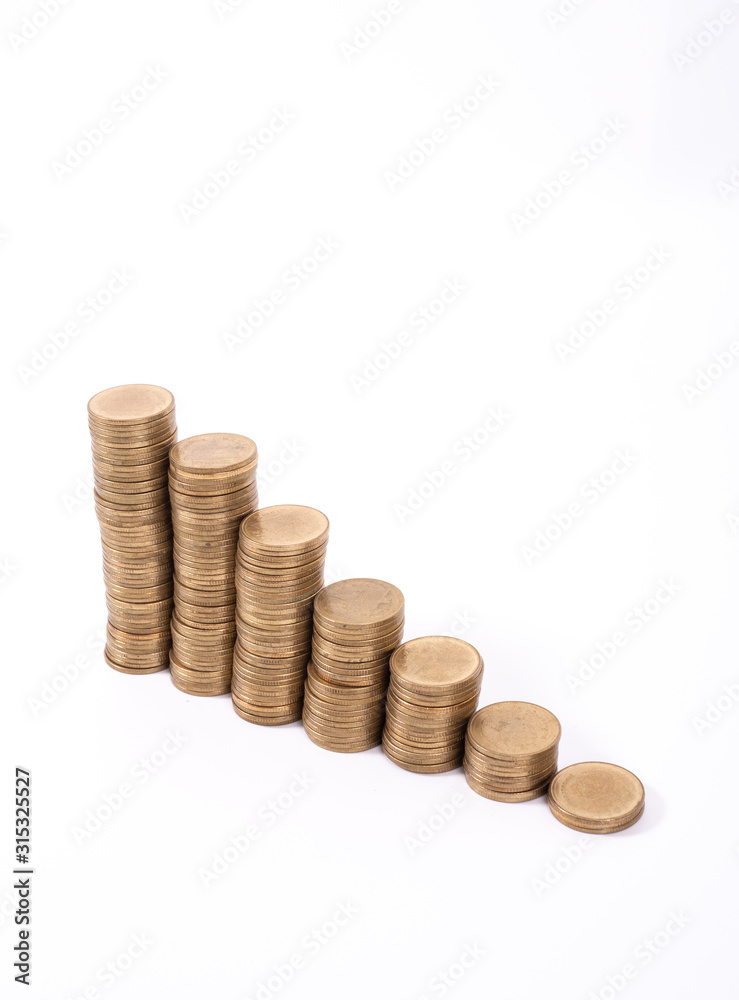 Savings, increasing columns of gold coins isolated on white background Savings, increasing columns of gold coins isolated on white background