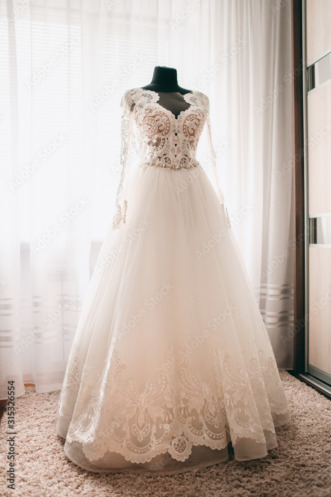 white wedding dress on mannequin white wedding dress on mannequin