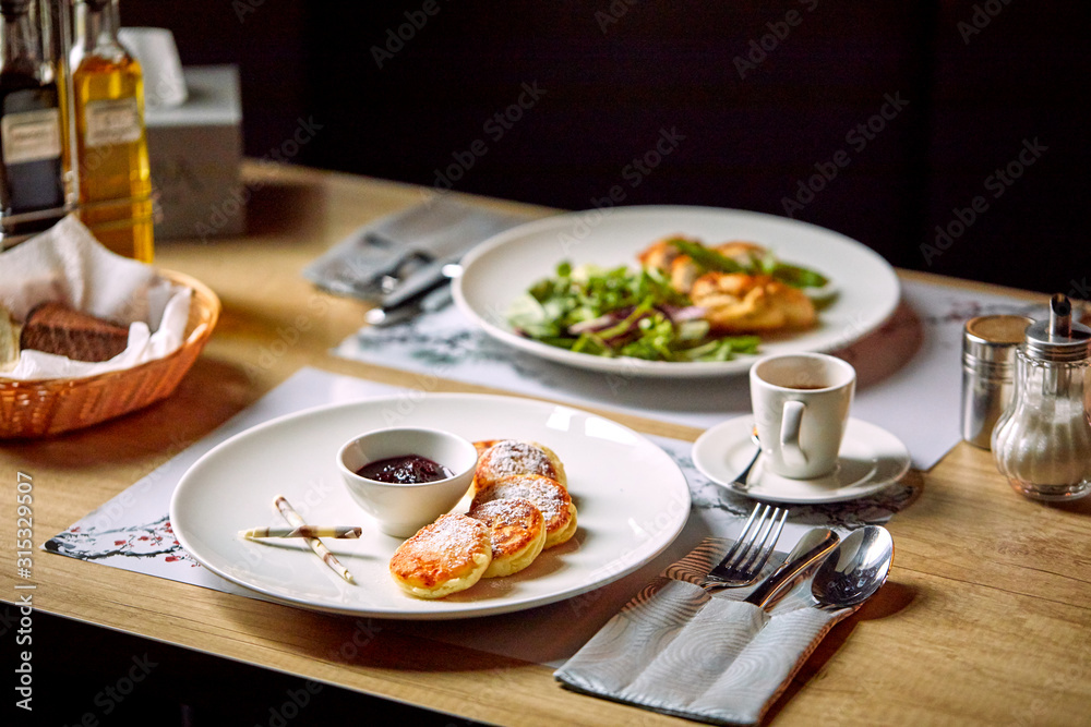 breakfast in the cafe, pancakes and coffee breakfast in the cafe, pancakes and coffee