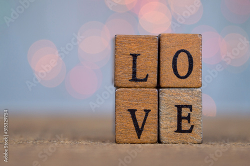 Love sign on wooden cubes