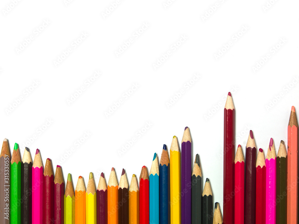 various colors of pencils on a white background, copy space various colors of pencils on a white background, copy space