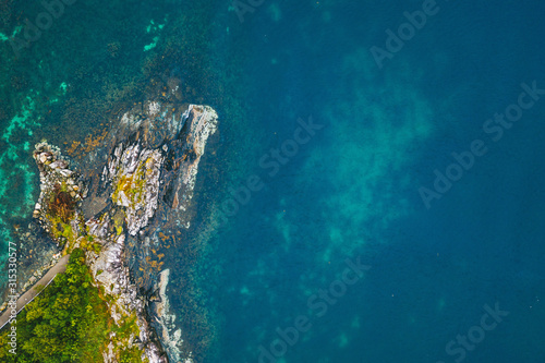 Drone aerial view of blue Norway fjord water