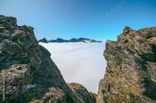 Hiking on the ridge of Romsdalseggen in Norway