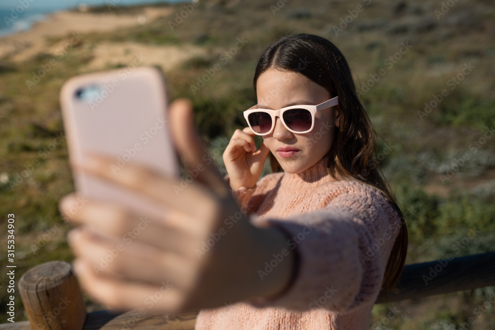teenage girl with pink wireless headphones teenage girl with pink wireless headphones