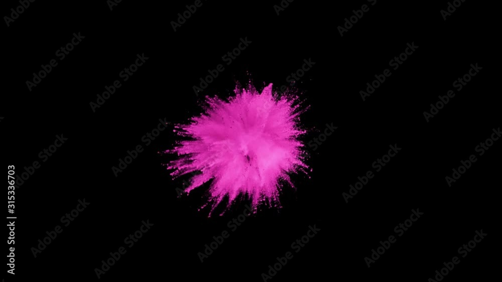 Colored purple powder explosion, abstract close up dust isolated on black background in slow motion Colored purple powder explosion, abstract close up dust isolated on black background in slow motion