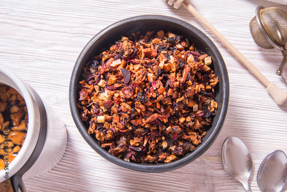 Fototapeta premium Вried fruit tea in winter season on wooden table