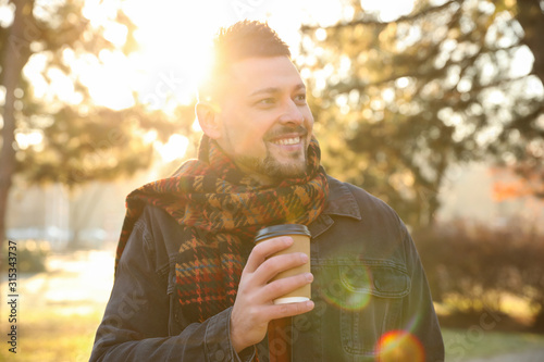 Man with cup of coffee in morning outdoors © New Africa