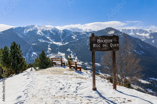Obraz na płótnie Idyllic relax viewpoint and winter snow landscape view in Mirador Roc del Quer, Andorra, Pyrenees mountains, South Europe. Andorra is famous tourist travel destination for skiing and winter rest w salonie