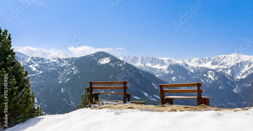 Idyllic relax viewpoint and winter snow landscape view in Andorra, Pyrenees mountains, South Europe. Andorra is famous tourist travel destination. Luxury amazing resort for skiing and winter rest
