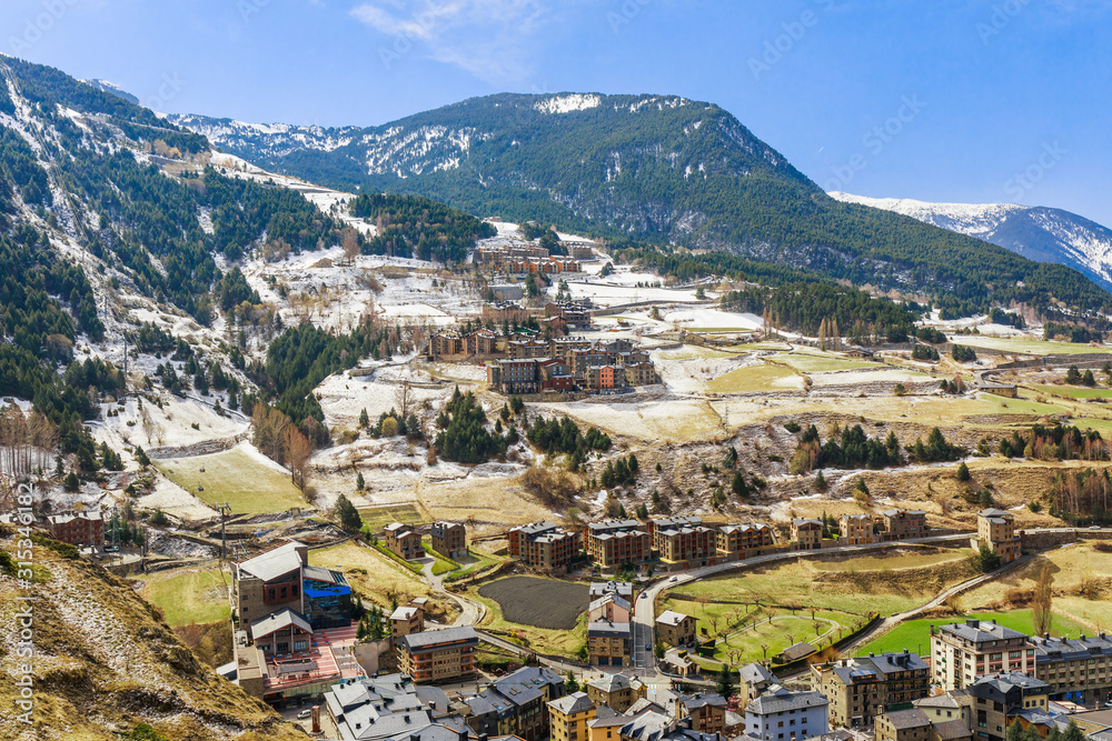Panoramic landscape mountain view in Andorra, valley of Pyrenees mountains, South Europe. Andorra is a famous tourist travel destination. Luxury amazing resort with clear forests and mountains