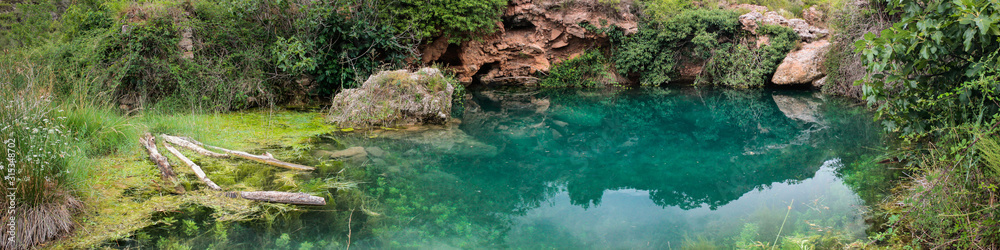 Panoramic of mountain lake whit green water, in Castellon, Spain.