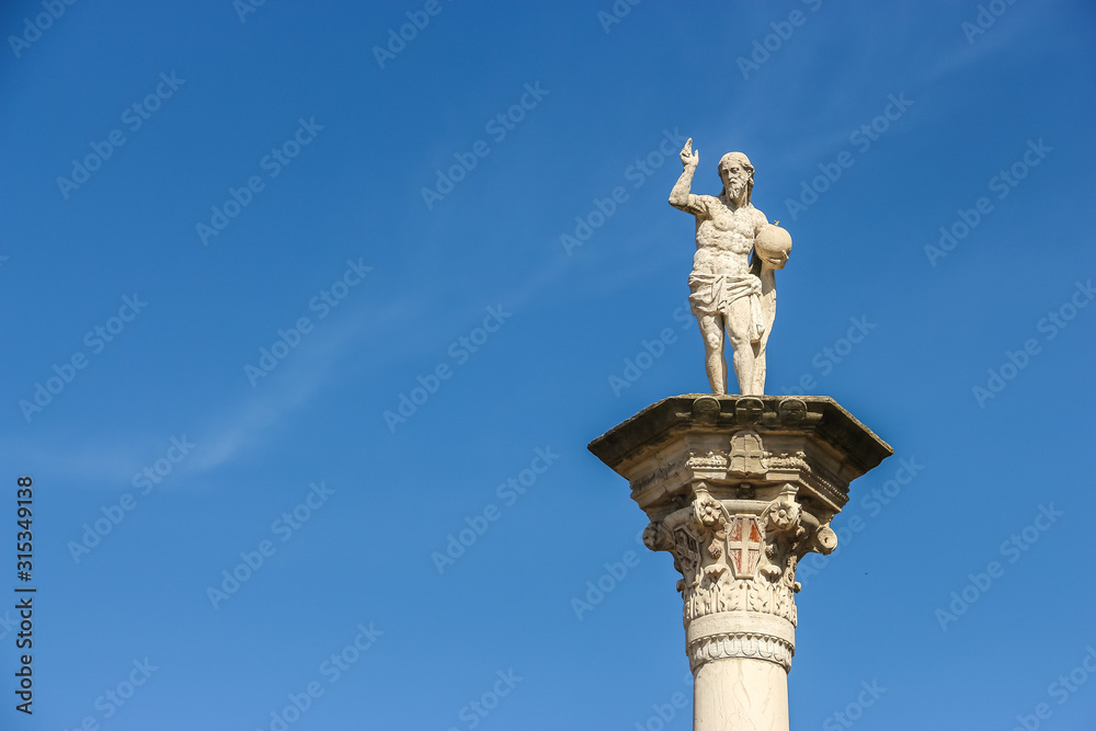 Vicenza, Italy. Ancient columns with statues on the Piazza dei Signori in Vicenza.